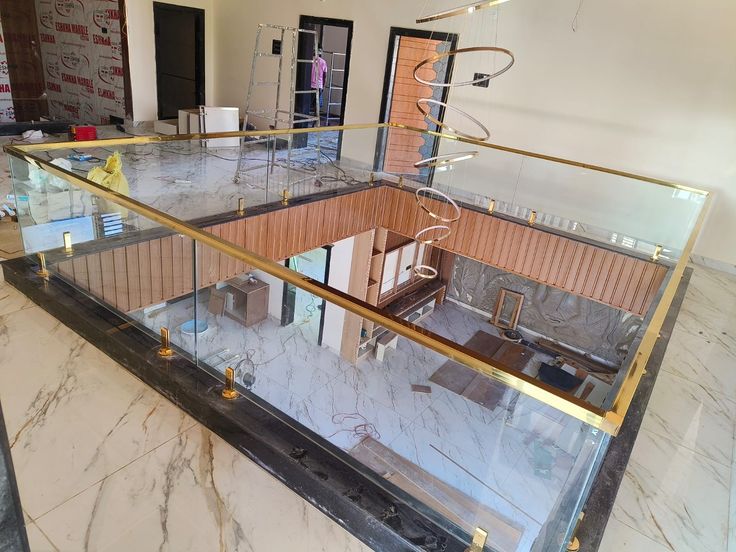 Clear glass balcony balustrade with metal fittings
